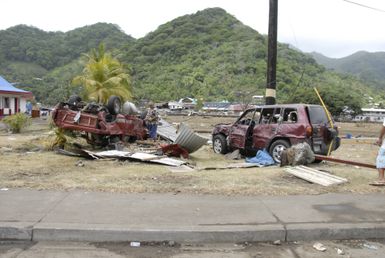 Earthquake ^ Tsunami - Pago Pago, American Samoa, October 1, 2009 -- Pago Pago, October 1, 2009 - A resident of American Samopa two cars that were damaged by the tsumani that hit American Samoa.