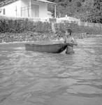 Boy and canoe