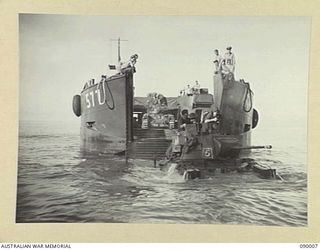 TOKO, BOUGAINVILLE. 1945-03-28. A MATILDA TANK BEING DRIVEN ASHORE FROM AN AMERICAN OPERATED LANDING CRAFT TANK DURING THE LANDING OF PORTION OF B SQUADRON, 2/4 ARMOURED REGIMENT IN THE TOKO ..