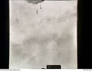 Lakunai, Rabaul, New Britain, 1944-12-06. Aerial view, taken at an altitude of 9,500 feet from aft the bomb bay of an unidentified United States Army Air Force (USAAF) bomber (serial no. ..