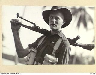 SIAR, NEW GUINEA. 1944-06-25. V190340 PRIVATE M.F. HILLBERG, MM, A BREN GUNNER OF A COMPANY, 57/60TH INFANTRY BATTALION, WHO RECEIVED HIS DECORATION FOR BRAVERY AT BRIDGE 6 DURING THE BOGADJIM ..