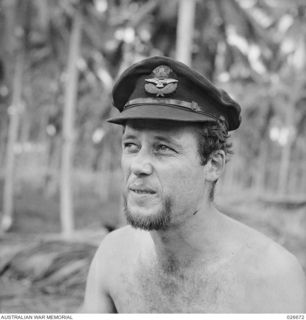 MILNE BAY, PAPUA. 1942-09. FLIGHT-LIEUTENANT J.W. PIPER, SERVING WITH 76 FIGHTER SQUADRON RAAF IN NEW GUINEA