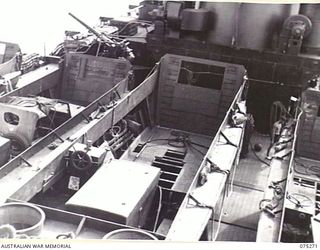 ALEXISHAFEN, NEW GUINEA. 1944-08-15. SOME OF THE MANY INVASION BARGES ON THE DECK OF THE RAN ASSAULT SHIP, "MANOORA"