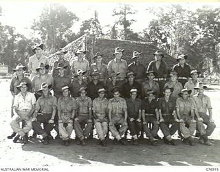 LAE, AREA, NEW GUINEA. 1944-11-18. PERSONNEL OF NO.3 PLATOON, GENERAL ENGINEERING COMPANY, 2/7TH ADVANCED WORKSHOPS, COMPANY COMMANDER NX200523 LIEUTENANT R.A. RODGERS PLATOON COMMANDER, NX6657 ..