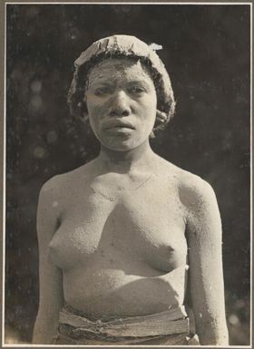 Widows, Ambasi, North Coast [woman covered in clay] Frank Hurley