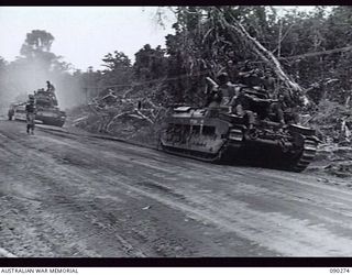 BOUGAINVILLE. 1945-03-30. NO. 7 TROOP, B SQUADRON, 2/4 ARMOURED REGIMENT MATILDA TANKS MOVING ALONG THE TOKO-DARARA ROAD IN THE MOVE FORWARD TO SUPPORT ADVANCING INFANTRY. THIS IS THE FIRST TIME ..