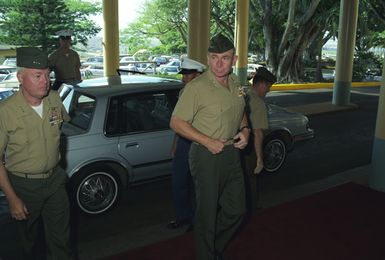 General (GEN) P.X. Kelly, commandant of the Marine Corps, arrives at the base. Lieutenant General (LGEN) D'Wayne Gray, commanding general, Fleet Marine Force Pacific, is at the right