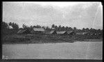 Houses on the coast at Utuia village, Gulf Province