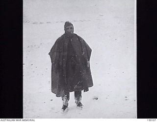 QASTINA, SYRIA. 1941-12. NX1951 SERGEANT R. N. BLAIN, B COMPANY, 2/2ND INFANTRY BATTALION, RUGGED UP AGAINST THE FALLING SNOW. HE DIED ON THE KOKODA TRAIL SERVING WITH THE 16TH BRIGADE