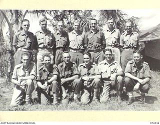 BULOLO, NEW GUINEA. 1944-07. PERSONNEL OF THE FIELD CASH OFFICE HEADQUARTERS, 11TH DIVISION. IDENTIFIED PERSONNEL ARE:- CORPORAL SULLIVAN (1); CORPORAL D. WEARNE (2); SERGEANT P. AUSTIN (3); ..