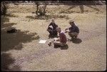 Archaeologist Roger Green, with Tapia, and Hu'a on front lawn, Moorea