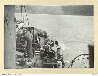 WIDE BAY, NEW BRITAIN. 1944-11-04. RAN VESSELS BOMBARDING JAPANESE POSITIONS WITH SECONDARY ARMAMENT