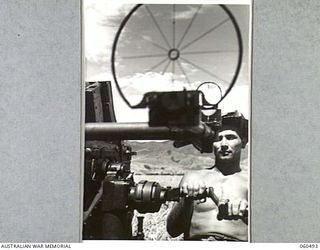 DUMPU AIRSTRIP, NEW GUINEA, 1943-11-14. QX21828 GUNNER H. W. NIESLER OF THE 2/4TH AUSTRALIAN LIGHT ANTI-AIRCRAFT REGIMENT