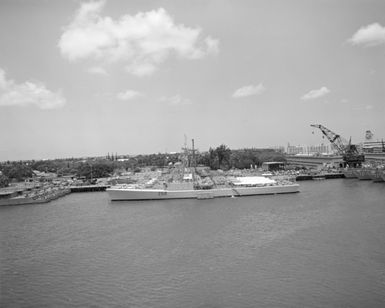 A port beam view of Canadian frigates moored to piers during Exercise RIMPAC '86