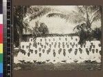 Group portrait of students seated outdoors, Beru, Kiribati, 1913-1914