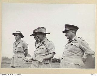 NADZAB, NEW GUINEA. 1945-05-11. GENERAL SIR THOMAS A. BLAMEY, COMMANDER-IN-CHIEF, ALLIED LAND FORCES, SOUTH WEST PACIFIC AREA (3), WITH LIEUTENANT COLONEL D.H. DWYER (2), LIEUTENANT GENERAL F.H. ..