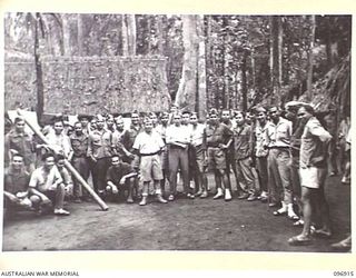 KUMUIA YAMA, RABAUL AREA, NEW BRITAIN. 1945-09-17. IN CONTRAST TO THE EMACIATED CONDITION OF INDIANS AT THE INDIAN PRISONER OF WAR CAMP IS THIS GROUP OF WELL FED, WELL CLOTHED JAVANESE. MANY ..