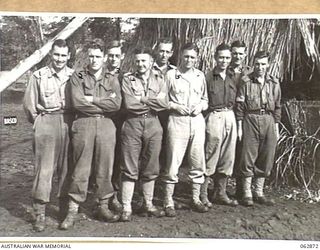 RAMU VALLEY, NEW GUINEA. 1944-01-15. MEMBERS OF THE ORDERLY ROOM STAFF OF HEADQUARTERS 15TH AUSTRALIAN INFANTRY BRIGADE. IDENTIFIED PERSONNEL ARE: VX87593 PRIVATE R. E. MARRIOTT (1); V43407 PRIVATE ..