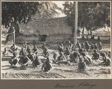 Wamira village [group of children palm frond weaving] Frank Hurley