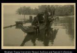 Admiralty people on a canoe