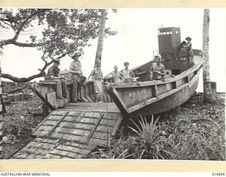 1943-04-20. NEW GUINEA. JAPANESE LANDING BARGES SUNK DURING AN UNSUCCESSFUL ATTACK HAVE NOW BEEN SALVAGED. THE BARGES ARE BEING REPAIRED FOR USE BY AUSTRALIAN FORCES. (NEGATIVE BY N. BROWN)
