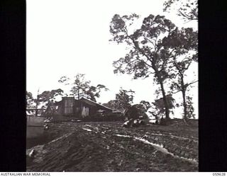 DONADABU, NEW GUINEA. 1943-11-09. ENTRANCE TO THE EILOGO SAWMILL OF THE 9TH AUSTRALIAN WORKSHOP AND PARK COMPANY, ROYAL AUSTRALIAN ENGINEERS