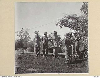 WIDE BAY, NEW BRITAIN, 1945-05-02. MAJOR-GENERAL H.C.H. ROBERTSON, GENERAL OFFICER COMMANDING 5 DIVISION (1), WITH COLONEL F.J. EMBREY (2), AND BRIGADIER K.A. MCKENZIE (3), DURING THE GOC'S TOUR OF ..