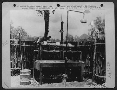 Officer'S Shower Of The 35Th Fighter Group, Headquarters, And The 35Th Fighter Control Squadron At Port Moresby, Papua, New Guinea, March 1943. (U.S. Air Force Number D59583AC)