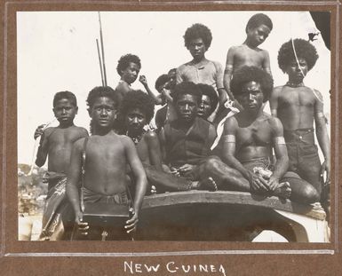 Men and boys on the deck of a boat, Port Moresby, 1914
