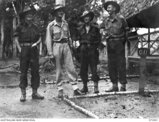 BUNA, NEW GUINEA. 1944-04-18. THE STAFF OF G BRANCH, HQ BUNA BASE SUB AREA. IDENTIFIED PERSONNEL ARE:- N242518 LANCE CORPORAL E KINGSTONE (1); WX31461 MAJOR P R ADAMS, GSO II, HQ BUNA BASE SUB AREA ..