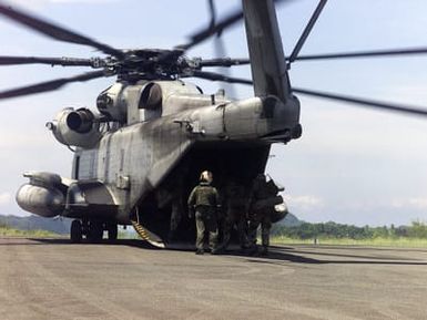 Marines from 3rd Battalion, 7th Marine Division India Company, practice and perfect a Tactical Recovery of Aircraft and Personal (TRAP) during Exercise KOA THUNDER 2001. KOA THUNDER is an exercise involving elements of 1ST Marine Air Wing (MAW), and 3rd Marine Division, where Marines conduct an Operational Readiness Exercise (ORE). The Aviation Support Element (ASE) from Kaneohe Bay, Hawaii, will be tested on command and control of several different missions, to include a TRAP, airfield seizures, and a Noncombatant Evacuation Operation (NEO)