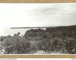 FINSCHHAFEN, NEW GUINEA, 1943-10-02. AN AIR ATTACK BY RAAF VULTEE VENGEANCE DIVE BOMBER AIRCRAFT ON JAPANESE POSITIONS ON THE HEADLAND