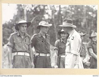 HONGORAI RIVER, BOUGAINVILLE, 1945-07-04. HIS ROYAL HIGHNESS, THE DUKE OF GLOUCESTER, GOVERNOR-GENERAL OF AUSTRALIA (3) SPEAKING TO MEMBERS OF 2 FIELD REGIMENT FROM FORWARD UNITS IN 3 DIVISION ..