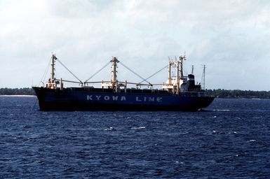 A port beam view of a Japanese freighter underway, taken from the salvage ship USS BOLSTER (ARS 38). Majuro is a large Japanese shipping port