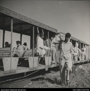 Workers riding the train