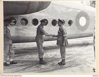 TOROKINA, BOUGAINVILLE. 1945-07-03. HIS ROYAL HIGHNESS, THE DUKE OF GLOUCESTER, GOVERNOR-GENERAL OF AUSTRALIA (2), BEING GREETED BY LIEUTENANT GENERAL S.G. SAVIGE, GENERAL OFFICER COMMANDING 2 ..