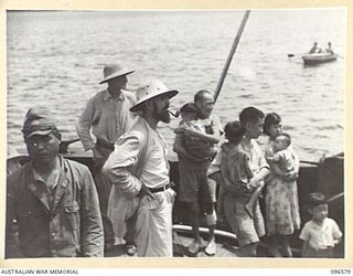 SORAKEN PENINSULA, BOUGAINVILLE. 1945-09-14. A MOTOR LAUNCH CARRYING MEMBERS OF HEADQUARTERS 2 CORPS, PREPARED FOR SURRENDER DISCUSSIONS WITH THE JAPANESE AT A SEA RENDEZVOUS OFF SORAKEN PENINSULA, ..