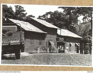 17 MILE, LALOKI RIVER, NEW GUINEA. 1943-11-22. THE CORDIAL FACTORY ESTABLISHED AND OPERATED BY THE AUSTRALIAN DEFENCE CANTEEN SERVICES ATTACHED TO HEADQUARTERS, NEW GUINEA FORCE