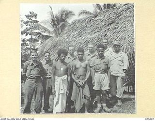 ORO BAY, NEW GUINEA. 1943-07. MEMBERS OF THE 10TH FIELD AMBULANCE, AUSTRALIAN ARMY MEDICAL CORPS OUTSIDE THE ANNEX TO ONE OF THE WARDS