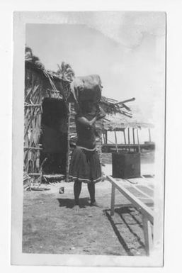 [Bougainvillean Woman Carrying Bundle On Head, #1]
