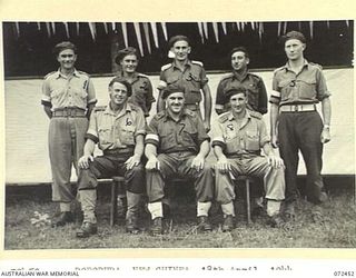 DOBODURA, NEW GUINEA. 1944-04-18. OFFICERS AT HEADQUARTERS NO.3 COMPANY, 18TH LINES OF COMMUNICATION SIGNALS. IDENTIFIED PERSONNEL ARE:- VX104031 LIEUTENANT H. RAND, HEADQUARTERS NO. 3 COMPANY (1); ..