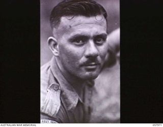 LAE, NEW GUINEA. 1943-10-04. PORTRAIT OF NX9706 WARRANT OFFICER I C. T. HALMARICK, PHOTOGRAPHER, MILITARY HISTORY SECTION