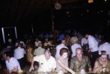 French Polynesia, tourists eating meal at resort on Moorea Island