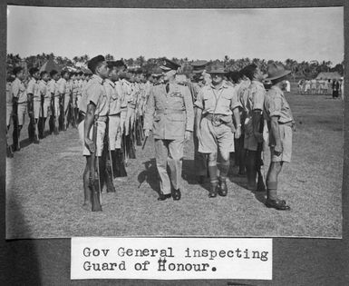 Governor General of New Zealand, Sir Cyril Newall, in Tonga, inspecting soldiers of the guard of honour formed by the Tonga Defence Force of 2nd NZEF