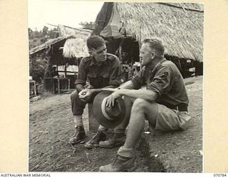 GABENSIS, NEW GUINEA, 1944-03-02. NG2464 WARRANT OFFICER II, HENRY J. O'KENE, AUSTRALIAN NEW GUINEA ADMINISTRATIVE UNIT REPRESENTATIVE AT GABENSIS, (1), A FORMER MINER IN THE GOLD RUSH TO EDIE ..