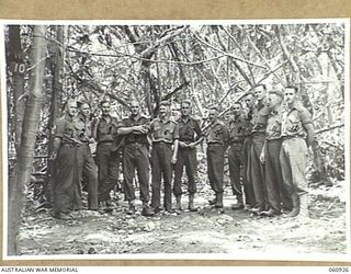 NEW GUINEA. 1943-11-28. STAFF OFFICERS OF HEADQUARTERS, 24TH AUSTRALIAN INFANTRY BRIGADE. THEY ARE LEFT TO RIGHT: WX5268 CAPTAIN H. J. C. NORRIS STAFF CAPTAIN LEARNER; SX9479 CAPTAIN J. H. WILTON ..