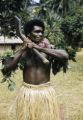 Fiji, indigenous man holding war club