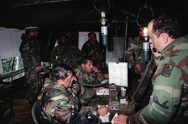 Members of the 29th Infantry Brigade, Hawaii Army National Guard, operate a command post in the field during the combined South Korean/U.S. exercise Team Spirit '90