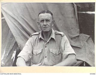 WEWAK AREA, NEW GUINEA. 1945-06-28. CORPORAL L.B. VIVIAN, 6 MILITARY HISTORY FIELD TEAM ATTACHED HEADQUARTERS 6 DIVISION