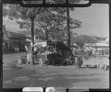 Fruit stalls, Papeete, Tahiti, locals selling fruit